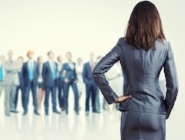 Powerful businesswoman standing with back with business team at background-642012-edited.jpeg Powerful businesswoman standing with back with business team at background-642012-edited.jpeg