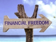 Financial Freedom wooden sign with a beach on background -663286-edited.jpeg Financial Freedom wooden sign with a beach on background -663286-edited.jpeg